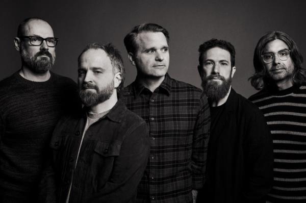 Black and white photograph of Death Cab for Cutie band members